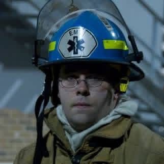 Portrait in fire and EMS helmet, Frederick County Fire and Rescue