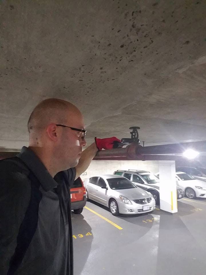 Inspecting a commercial fire sprinkler head